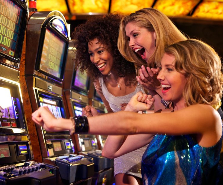 girls playing on slots